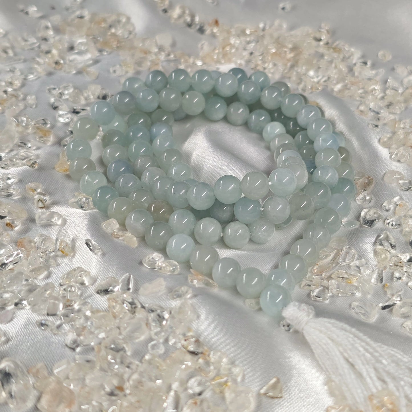 Energised Aquamarine Japa Mala by THE GEM’Z handcrafted with natural aquamarine beads to promote peace, emotional clarity, and calm.