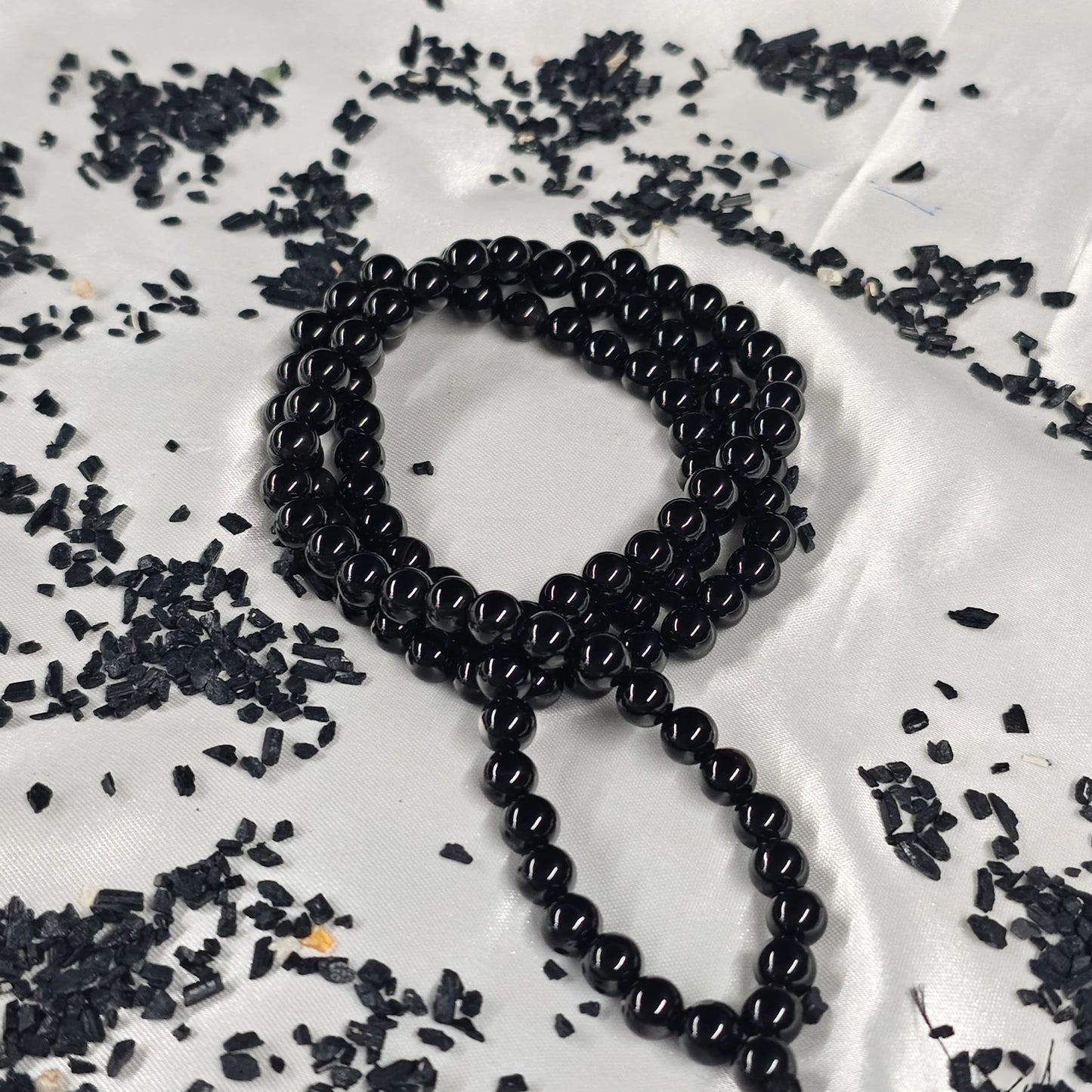 Energised Black Tourmaline Japa Mala by THE GEM’Z handcrafted with natural black tourmaline beads for grounding, protection, and purification.