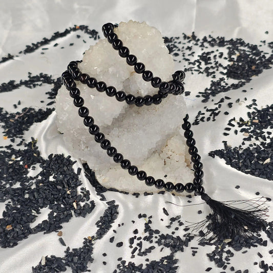 Energised Black Tourmaline Japa Mala by THE GEM’Z showing natural black tourmaline beads for meditation, energy balance, and protection.