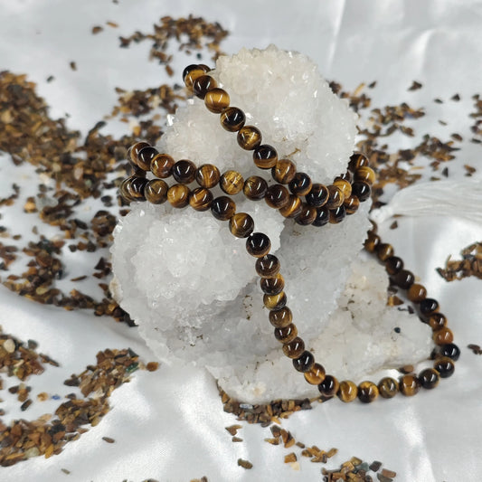 Energised Tiger Eye Japa Mala by THE GEM’Z showing natural tiger eye beads for meditation, focus, and inner strength.