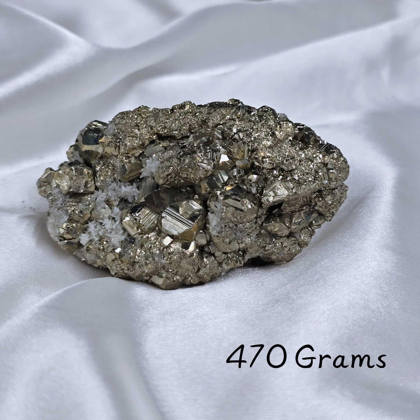 Collection of Energised Pyrite Rough stones showcasing wealth and protection benefits