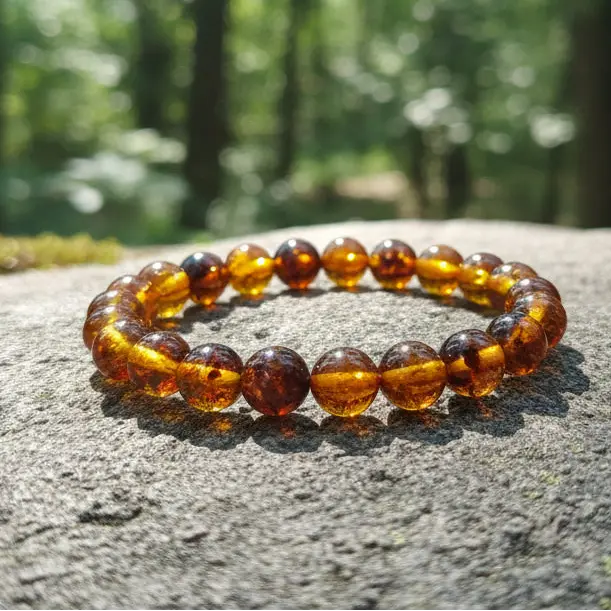 Buy natural Amber bracelet made from fossilized resin. Lightweight gemstone bracelet with warm tones for daily wear and positivity.