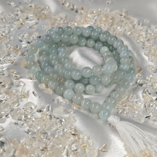 Energised Aquamarine Japa Mala by THE GEM’Z handcrafted with natural aquamarine beads to promote peace, emotional clarity, and calm.
