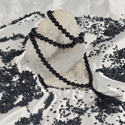 Energised Black Tourmaline Japa Mala by THE GEM’Z showing natural black tourmaline beads for meditation, energy balance, and protection.
