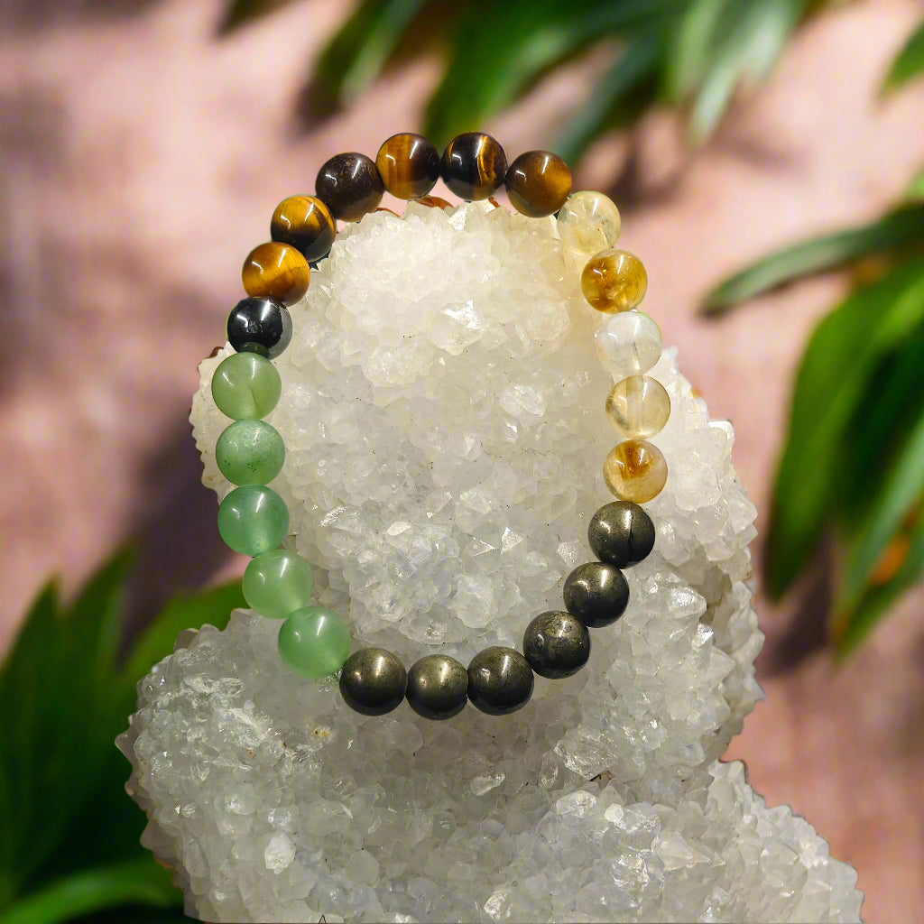 Energised Money Magnet Bracelet by THE GEM’Z handcrafted with natural crystals to attract wealth, success, abundance, and positive energy.
