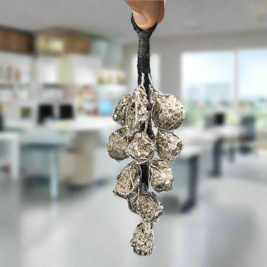Energised Pyrite Hanger by THE GEM’Z handcrafted with natural pyrite crystals to attract wealth, abundance, and positive energy.
