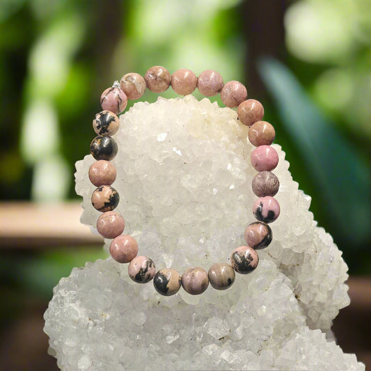 Energised Rhodonite Healing Bracelet by THE GEM’Z handcrafted with natural Rhodonite stones to promote love, balance, and emotional healing.
