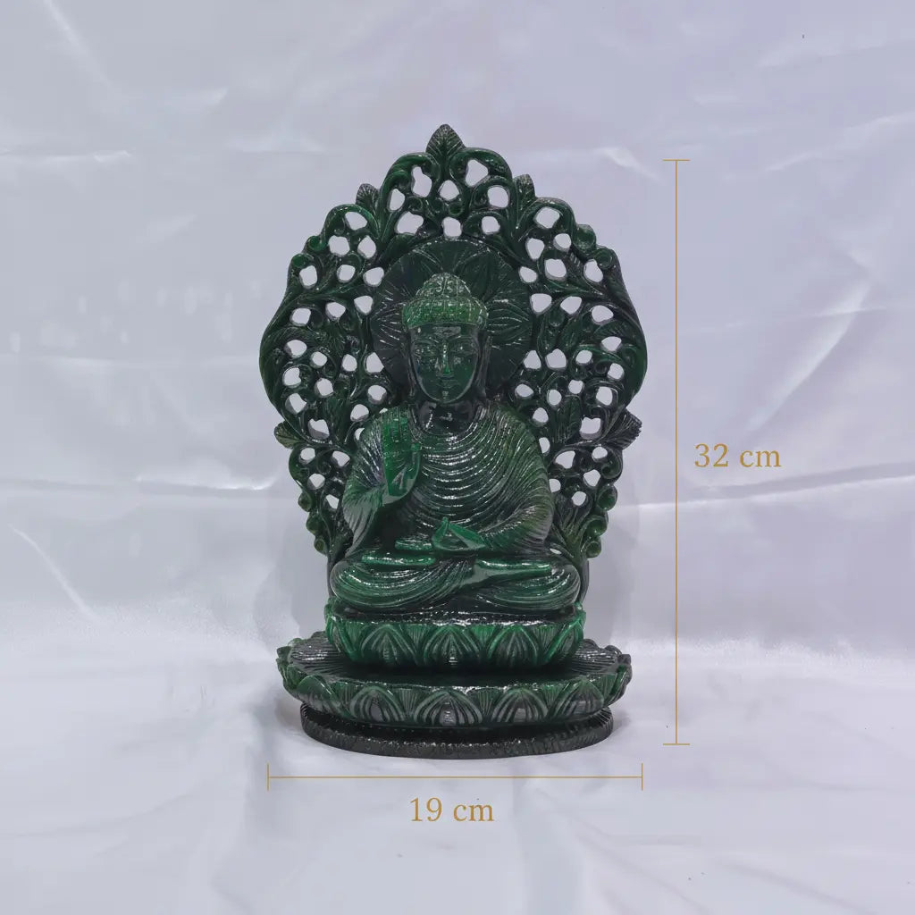 Green aventurine Buddha idol carved from single piece gemstone