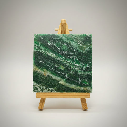 Polished green aventurine gemstone tile close-up texture