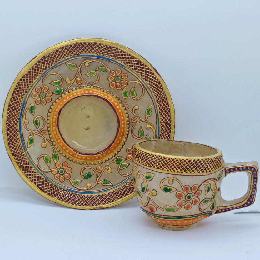 Spatik rock crystal cup and saucer on dining table for conscious living
