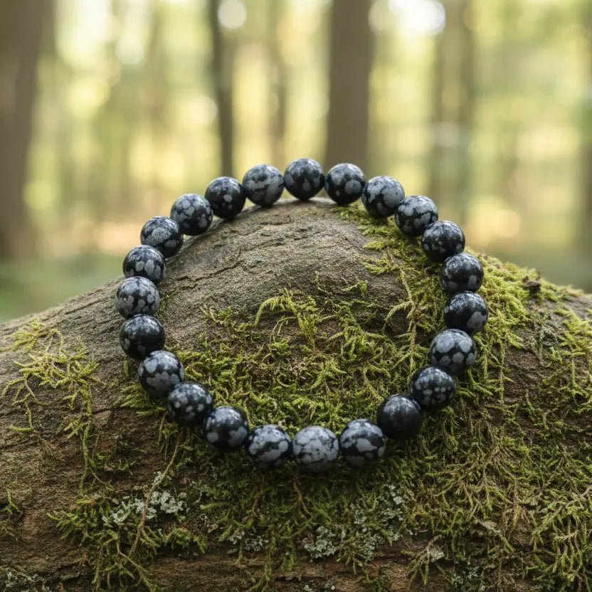 Natural Snowflake Obsidian gemstone with white patterns for grounding and balance
