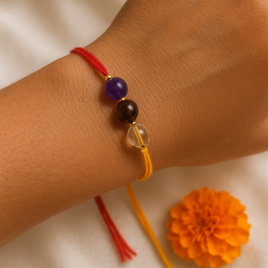 THE GEMZ Trinity Thread Rakhi with Clear Quartz, Tiger Eye and Amethyst for energy alignment and spiritual balance in India