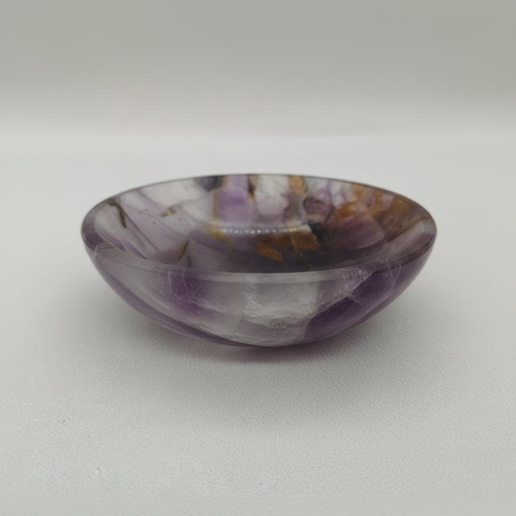 Polished natural amethyst bowl with purple tones for vastu and meditation use
