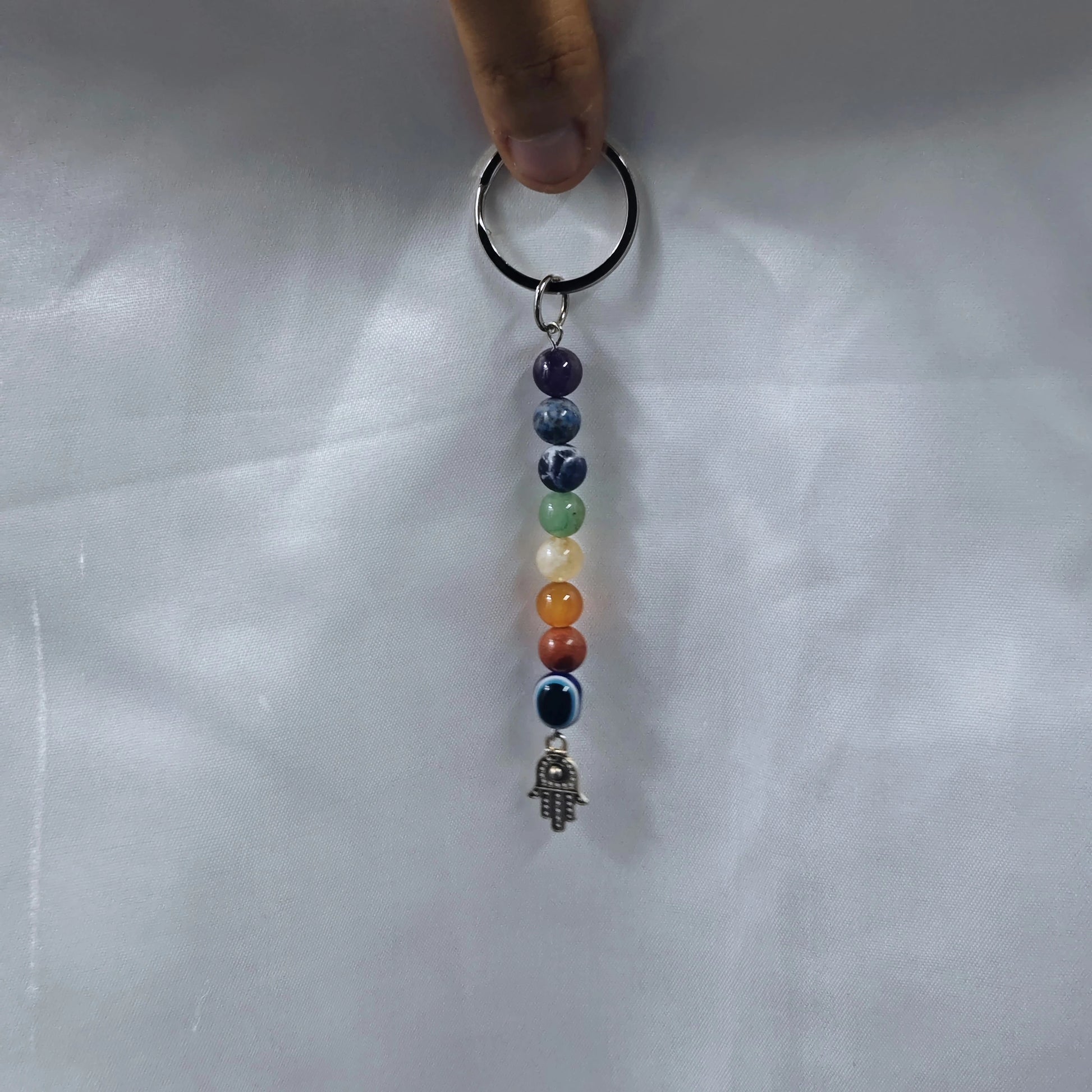  7 Chakra Keychain showing vibrant chakra stones and tree of life design
