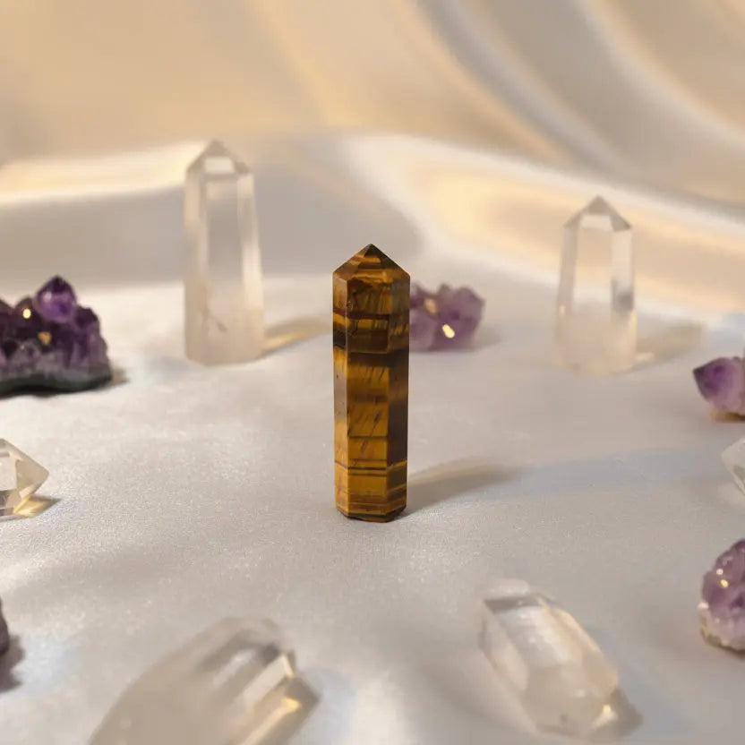 Natural tiger eye crystal pencil with golden brown gemstone tip for focus and confidence
