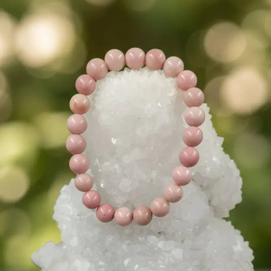 Rhodochrosite gemstone bracelet with natural pink stone beads, handcrafted healing crystal jewellery for love, emotional healing and inner balance